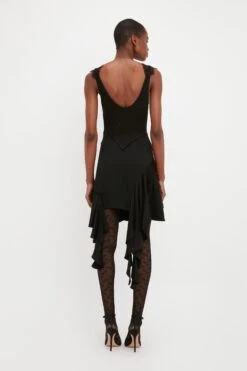 Victoria Beckham VB Monogram Tights In Black -Victoria Beckham VICTORIA BECKHAM LACE DETAIL RUFFLE MINI DRESS IN BLACK 1323WDR004839A BLACK BACK MODEL 4 JPG 1