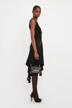 Victoria Beckham VB Monogram Tights In Black -Victoria Beckham VICTORIA BECKHAM LACE DETAIL RUFFLE MINI DRESS IN BLACK 1323WDR004839A BLACK STYLES MODEL 6 JPG