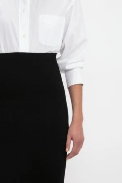 Victoria Beckham VB Body Fitted Midi Skirt In Black -Victoria Beckham VICTORIA BECKHAM VB BODY FITTED MIDI SKIRT IN BLACK 1222KSK003600A BLACK DETAIL MODEL 5 JPG A5