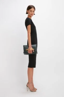 Victoria Beckham Spiral Fitted T-Shirt Dress In Black -Victoria Beckham VictoriaBeckham FittedT ShirtDressInBlack Black 1123WDR004413A 2700 4050 247 WHITE LR Side2 Model2 JPG